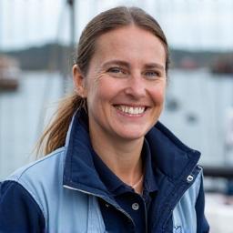 Jane McAllister smiling on deck